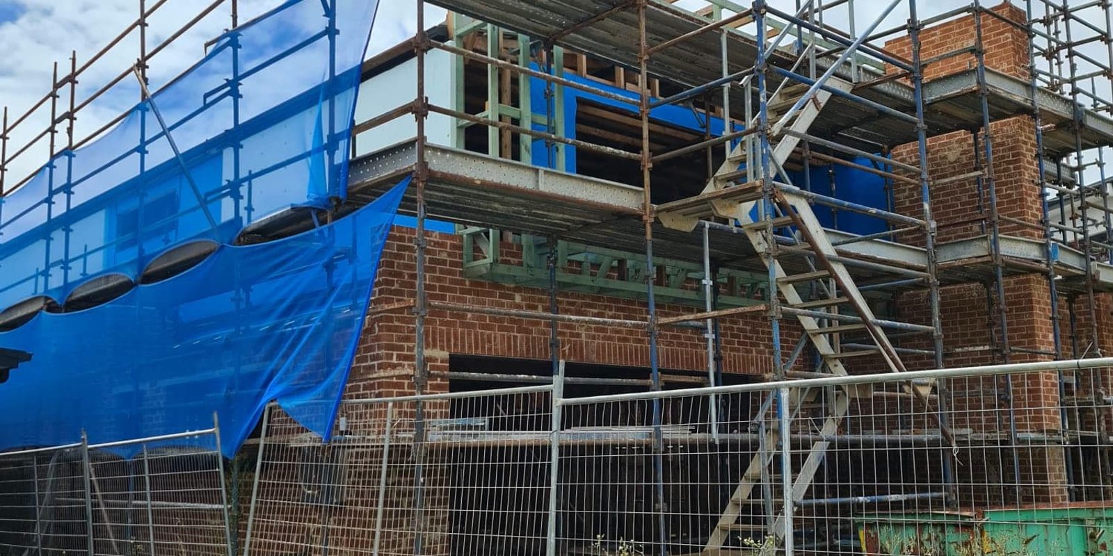 Brick home construction and building facade in progress
