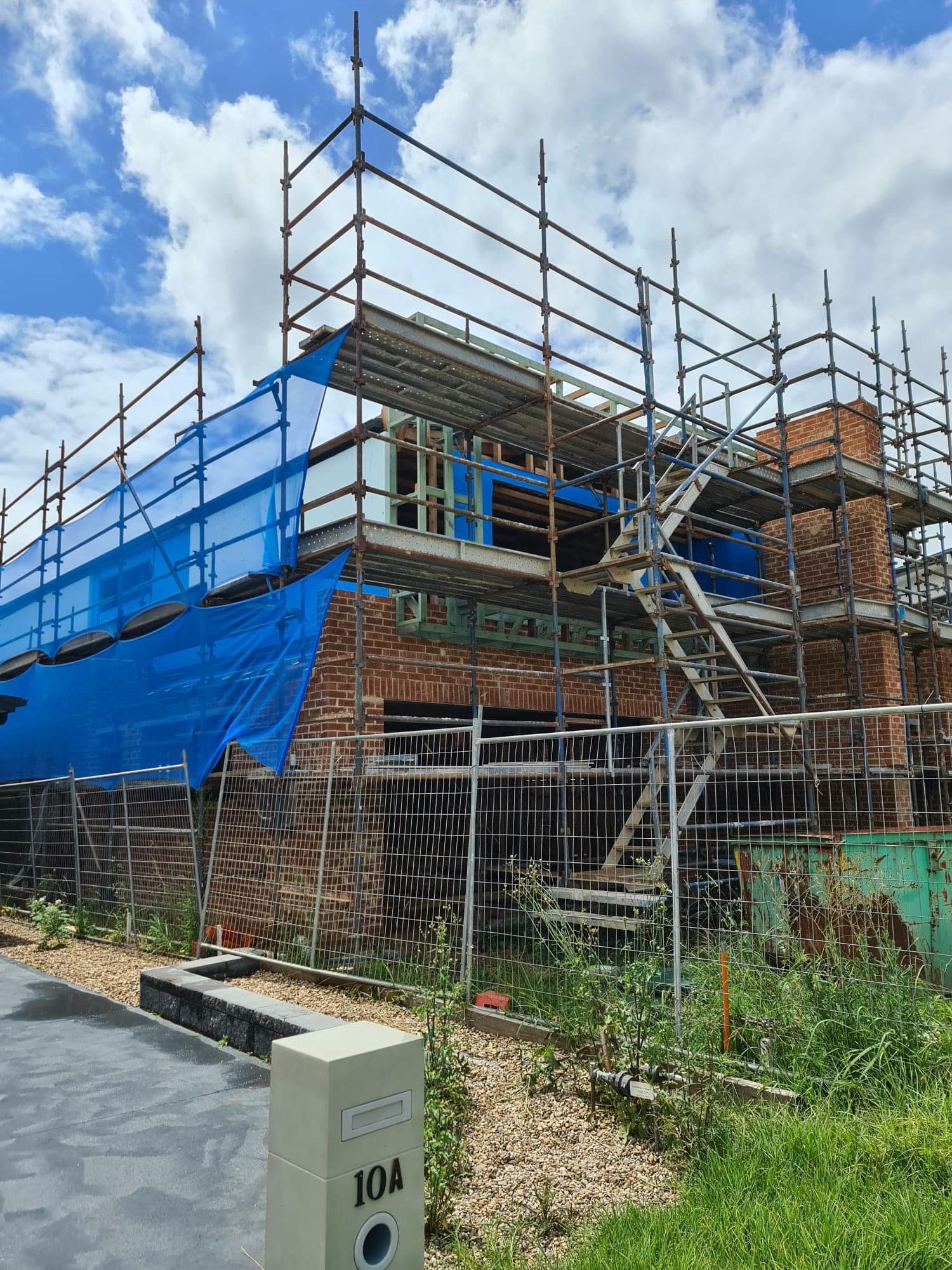 Brick home construction and building facade in progress