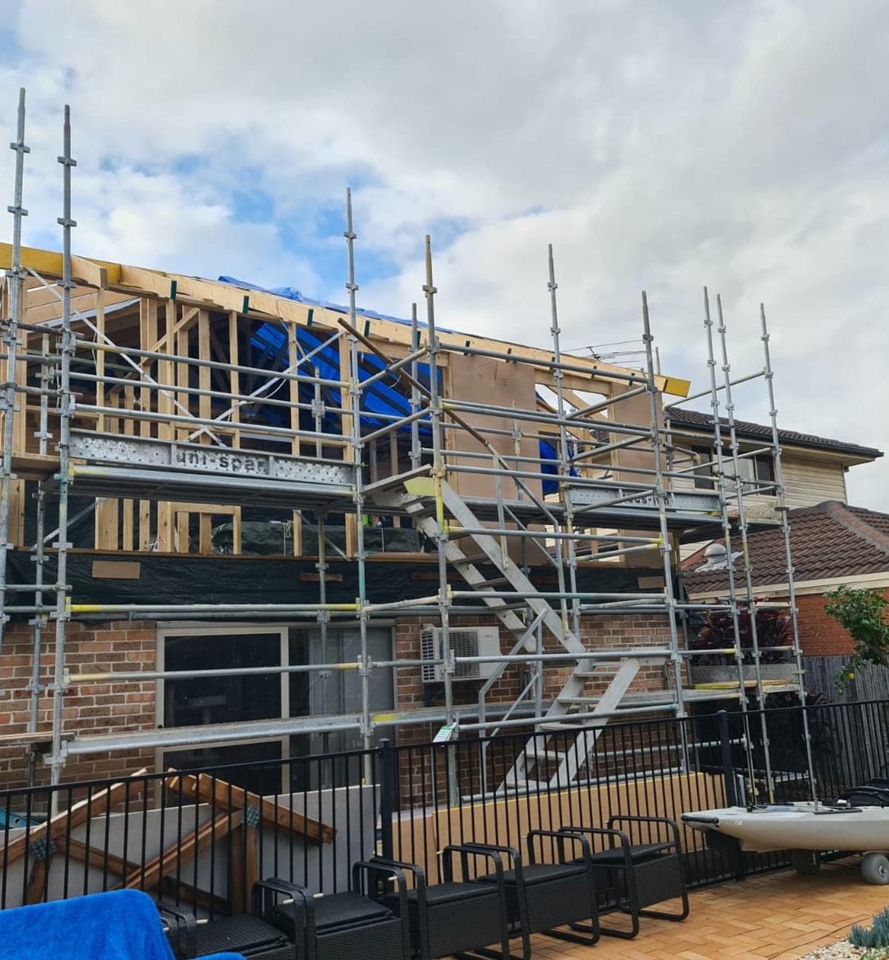 Completed two-storey home after first floor addition by Exalt Builder